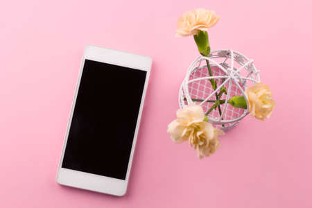 top view cell phone  pink backgroundの写真素材