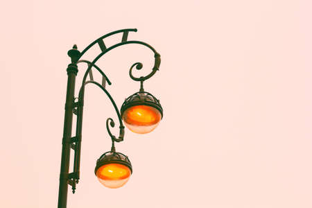 street lantern with orange lightの写真素材