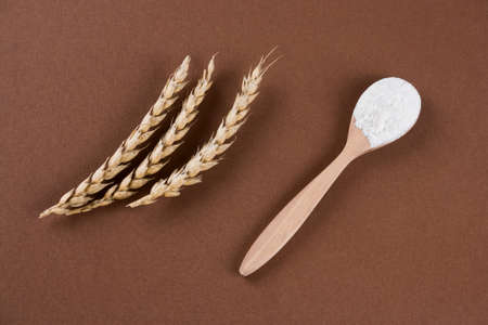 top view of the ears and flour brown backgroundの写真素材