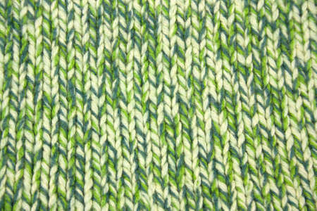 green knitted woolen sweater textureの写真素材