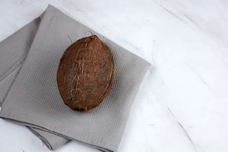 coconut on a marble background top view