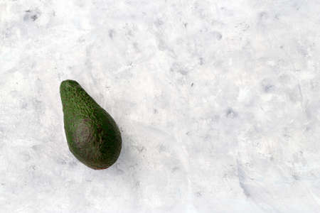 top view avocado on gray concrete background,copy spaceの写真素材
