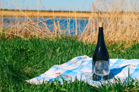 picnic with red wine outdoor, summer vacation conceptの写真素材