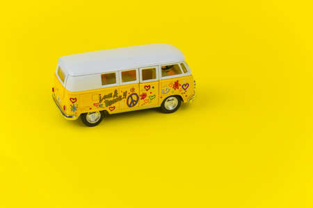 SOCHI,RUSSIA,  24 MAY 2019 -  retro  volkswagen bus toy  isolated over yellow background