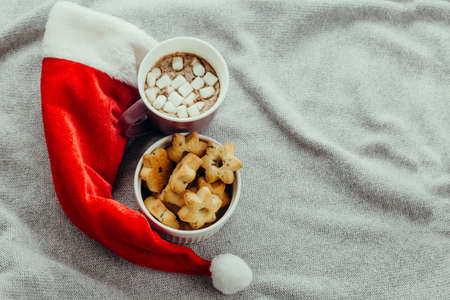 top view top view starshaped cookies,hot chocolate and Santa hatの写真素材