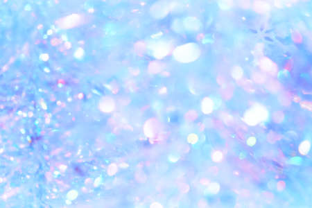Christmas tinsel blurred abstract holographic trend backgroundの写真素材