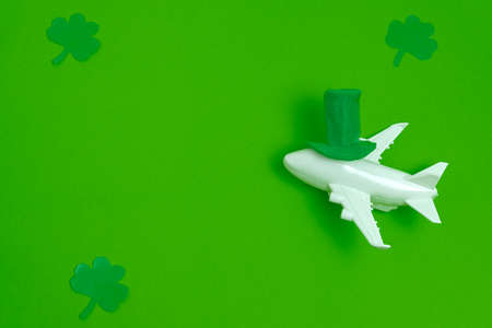 top view airplane with green hat and paper cut green leaves