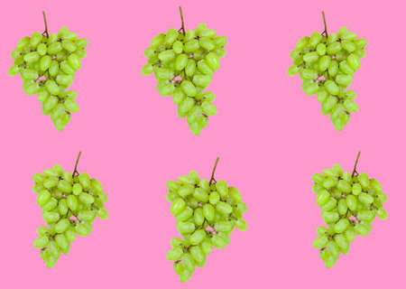 fresh ripe organic green grapes levitate in the air on white background, healthy eating and...