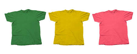 green, yellow and pink t shirts isolated on a white background , banner with blank clothes mock upの写真素材