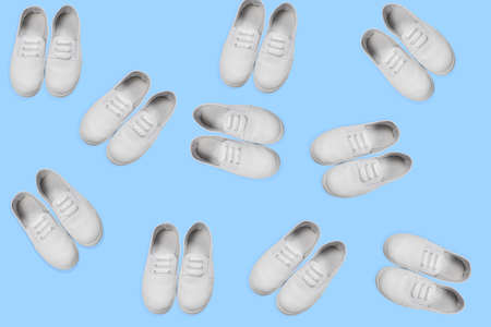 white sneakers pattern on a blue backgroundの写真素材