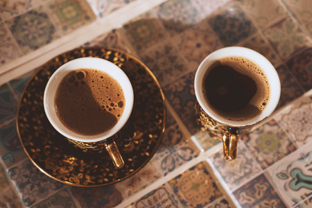 Top view close-up Turkish strong coffee cup on a blurred background oriental tiles.の写真素材
