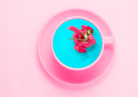 Top view flat lay coffee pink cup on with swimming pool in it. creative art minimal collage.の写真素材