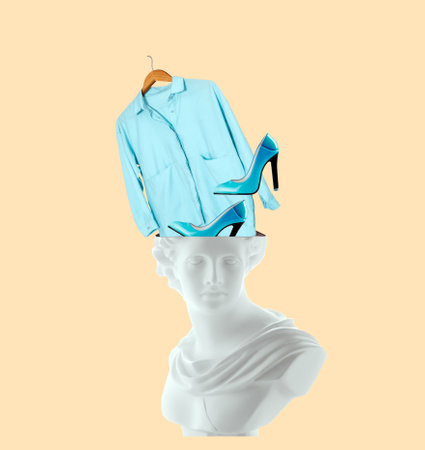 Creative art collage an ancient statue of a woman with blue shoes and dress flying out of her head on yellow background.の写真素材