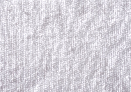 Texture clothes in spools close-up with copy space. Problem of poor quality clothing and quick wearの写真素材