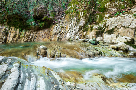 Beautiful landscape with the Kuapse River and rocky shoresの写真素材