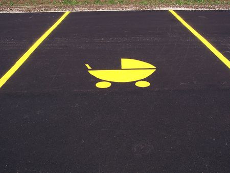 Parking spot reserved for parents of の写真素材