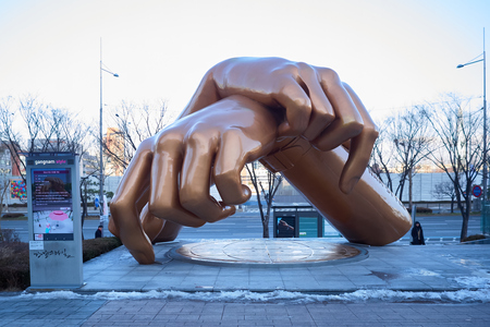 Seoul, South Korea - December 13 : A hand statue of gangnam style in winter South Korea, 2018. Gangnam style is a famous song by a Korean artist Psy.のeditorial素材