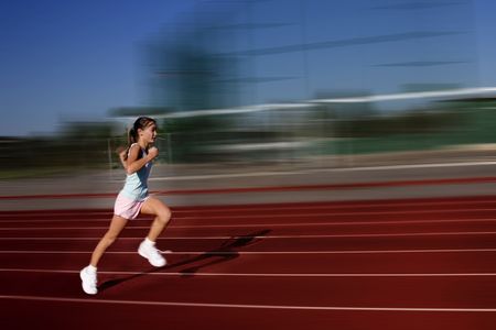 girl running at trackの写真素材