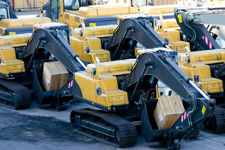 brand new excavators on the shipping dock