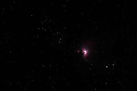 Great Orion Nebula shining brightly on a cold dark winter eveningの写真素材