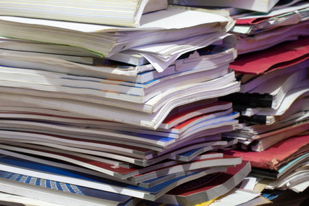 piles of books, magazines and waste paper. paper recycling