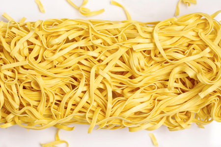 raw noodle isolated on white backgroundの写真素材