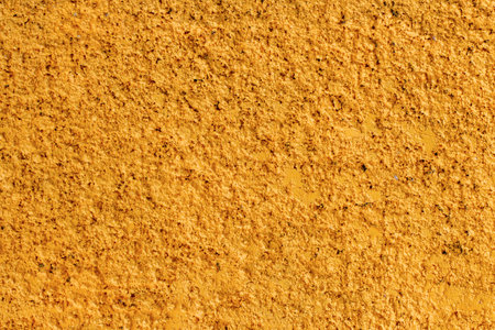 yellow painted wall rough texture for background