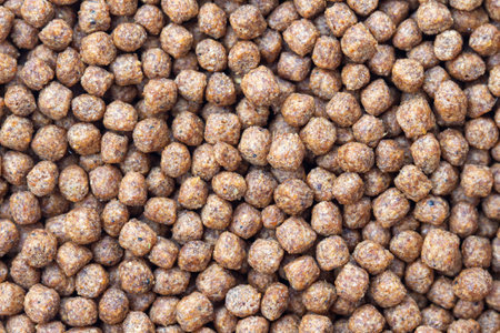 close up background of fish food pellets