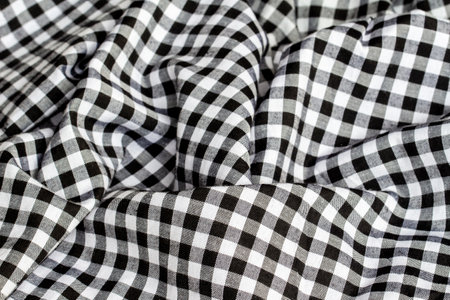 Black and white checkered fabric background. Cloth texture.の写真素材