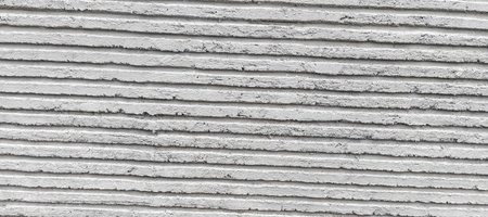 background wall with textured paint pattern wallpaperの写真素材