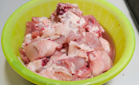 chicken meat in a basinの写真素材