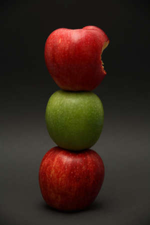 A line of apples with one exception.の写真素材