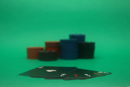 A great hand in a poker game with a green background.の写真素材