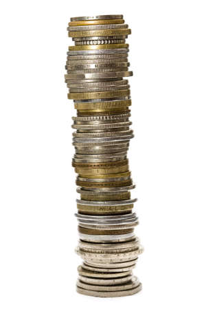 Loads of coins from around the world, isolated.