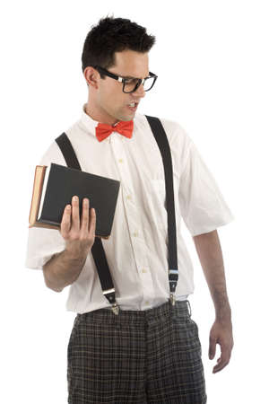 A young, caucasian nerd working out with books, isolated on a white background.の写真素材