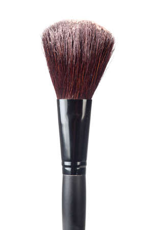 A blush brush with powder isolated on a white background.の写真素材