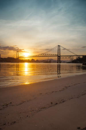 The Hercilio Luz Bridge, in Florianopolis, Brazil, with an amazing sunset.の写真素材