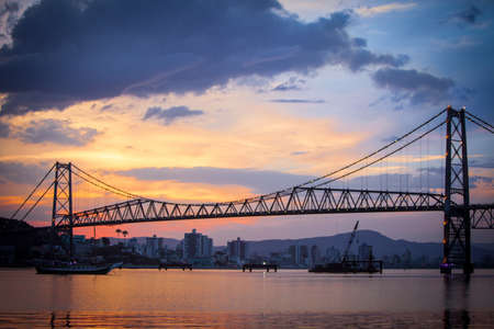 The Hercilio Luz Bridge, in Florianopolis, Brazil, with an amazing sunset.の写真素材