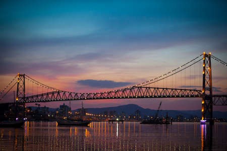 The Hercilio Luz Bridge, in Florianopolis, Brazil, with an amazing sunset.の写真素材