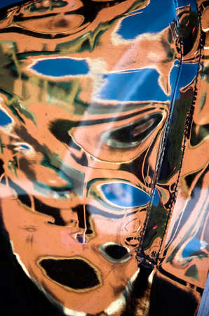 An abstract pattern reflected by a plastic screenの写真素材