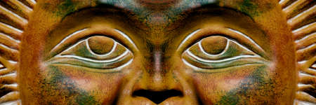 Close-up photo of a casting of a sun symbol.の写真素材