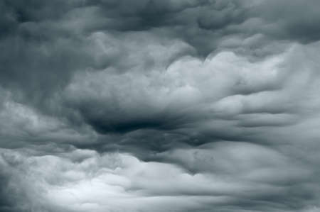 Dark storm clouds forming before the rain beginsの写真素材