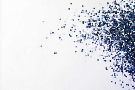 Blue glitter confetti on a white background. Festive abstract background.
