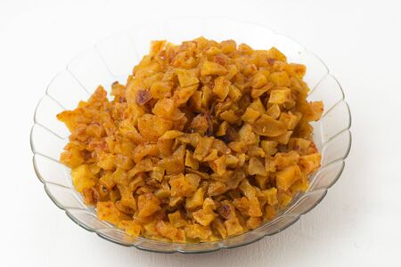 Kentang Balado is Indonesian homemade food, made from French fries cooked with sambal balado isolated on white backgroundの写真素材