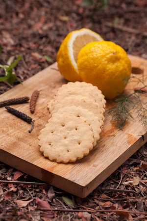 Lemonade biscuits cookies on wooden cutting board.の写真素材