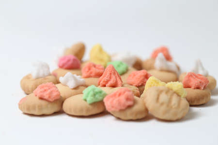 Belly button iced gem biscuits on white background