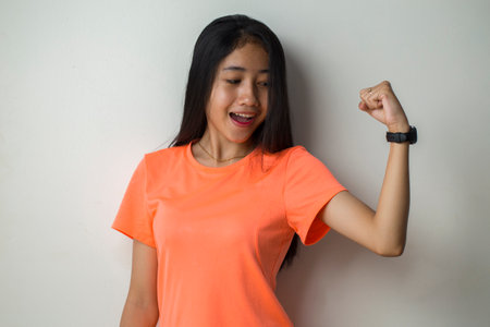 Gorgeous strong young asian sporty womanの写真素材