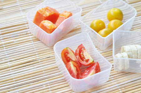 Box of fresh tropical fruitの写真素材