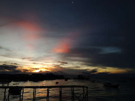 morning silhouette on the charming derawan islandの写真素材