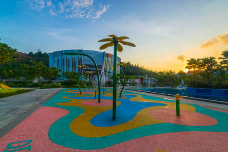 Batam, Indonesia - December
09 2018 Enjoy the beautiful Sunrise at Haris Resort Barelang with lounge chairs by theのeditorial素材